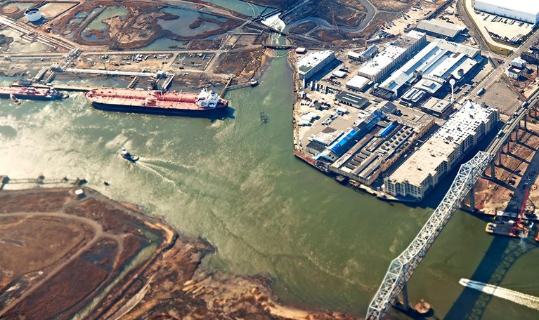 Aerial view of urban landscape with river and industry