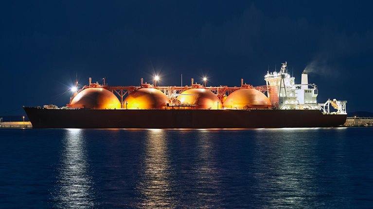 Picture of LNG tanker in port at night. - stock photo