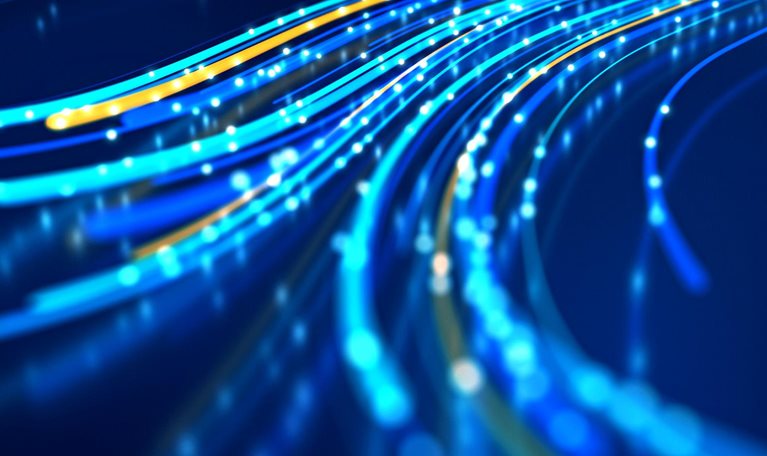 Close up of network data flowing on black background